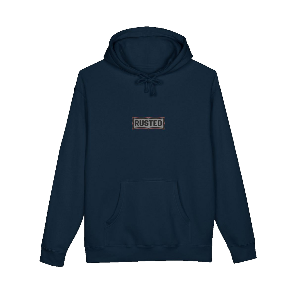 TRUST THE RUST chest badge on a navy hoodie