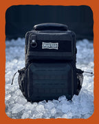 RUSTED Crew Pack 35L insulated cooler backpack sitting on a bed of ice
