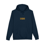 TRUST THE RUST chest badge on a navy hoodie