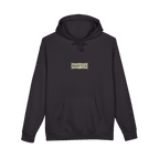 TRUST THE RUST chest badge on a black hoodie