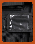 Clear vinyl ID window on the shoulder strap of the RUSTED Crew Pack