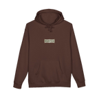 TRUST THE RUST chest badge on a brown hoodie