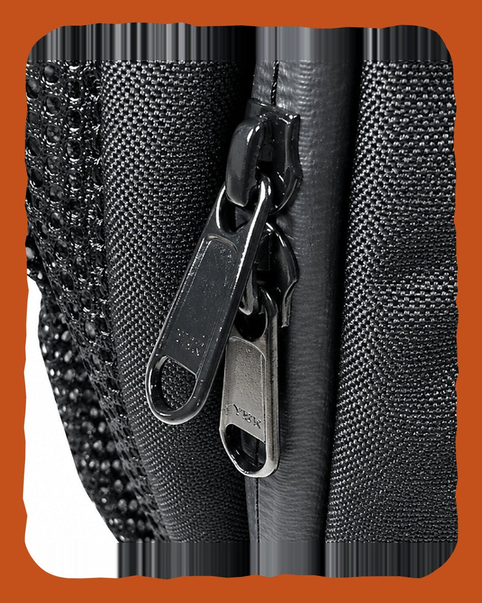 Zip pulls and mesh side pocket on the RUSTED Crew Pack