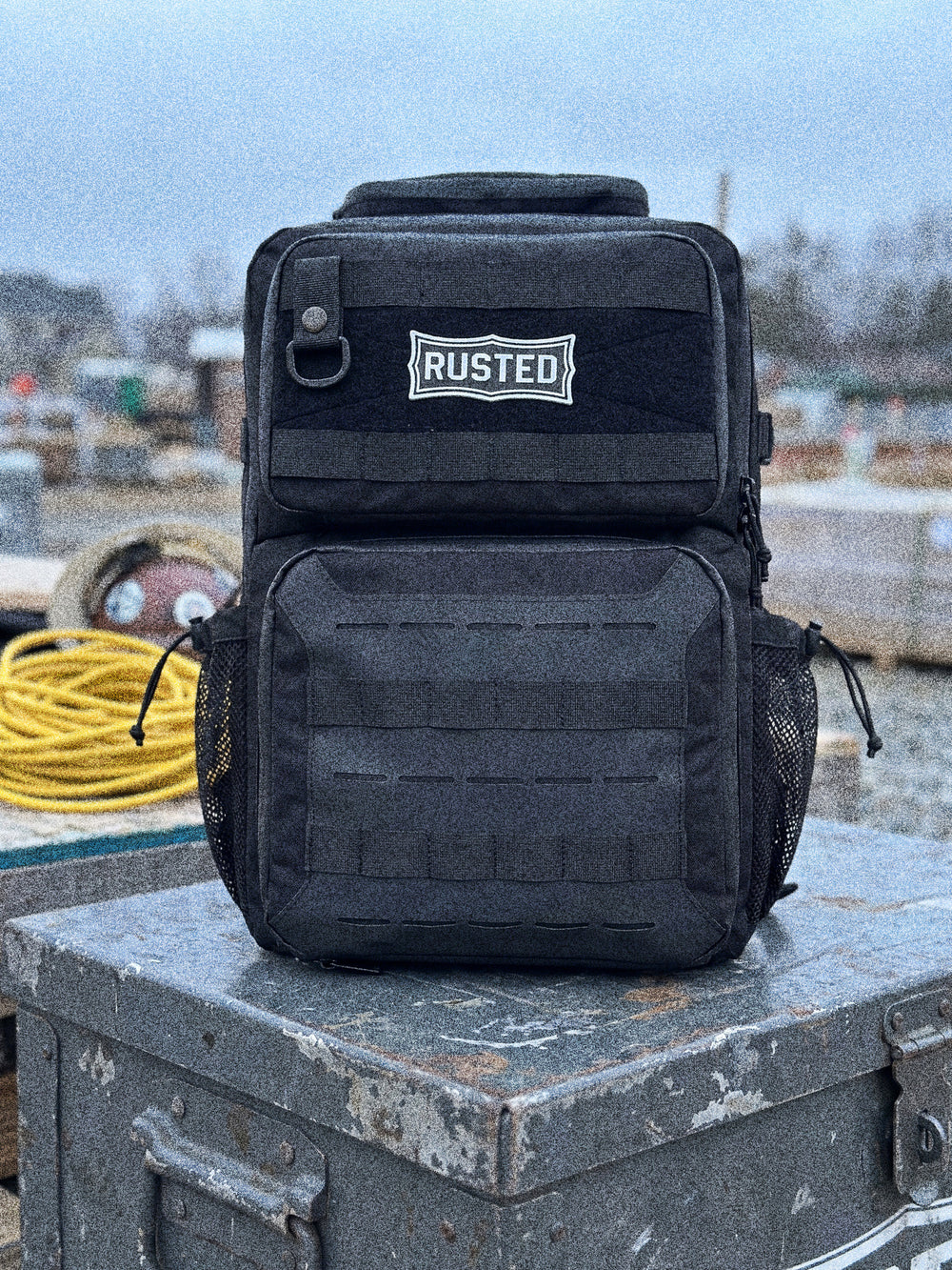 RUSTED Crew Pack on a steel gang box at a job site